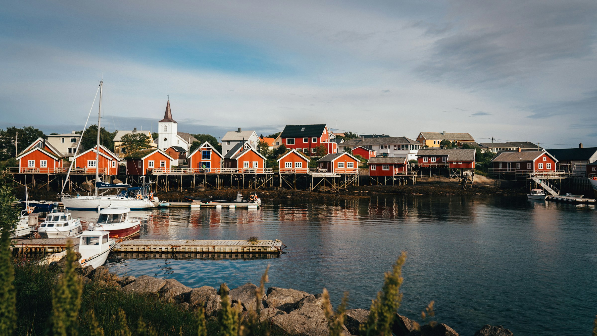 Lofoten Reine and its red rorbuer fishing cabins in Lofoten