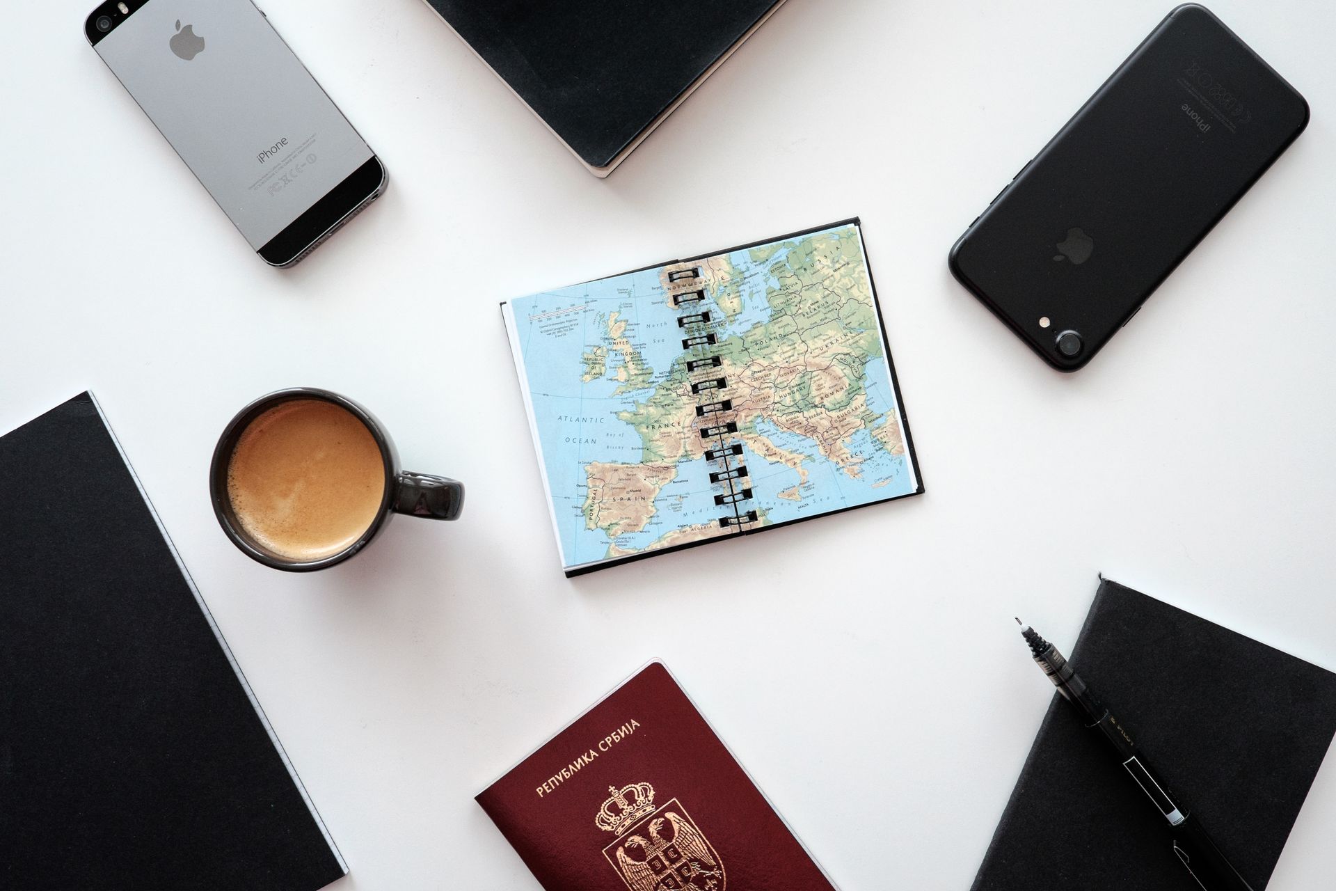 trip planning notebook map laptop desk trip planning notebook map laptop desk