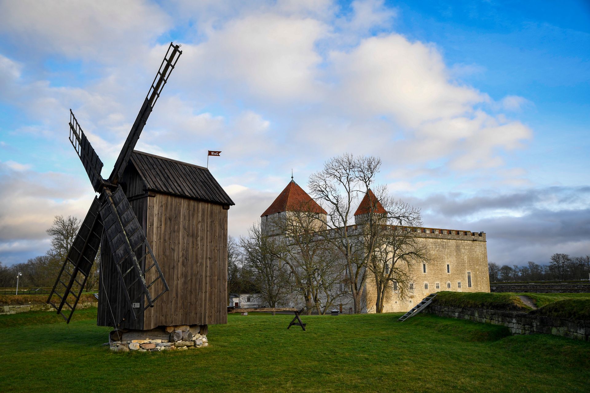 Saaremaa Kuressaare Castle and traditional windmill in Saaremaa