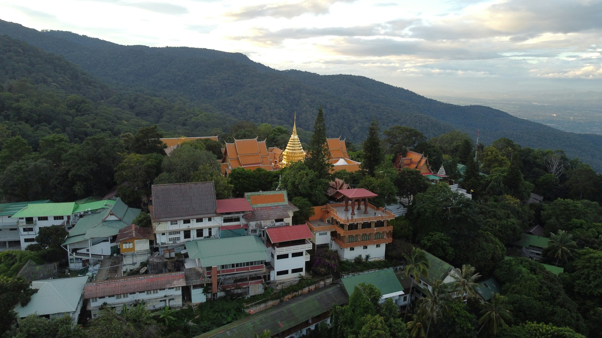 Thailand temple complex surrounded by mountain forest in Chiang Mai, Thailand