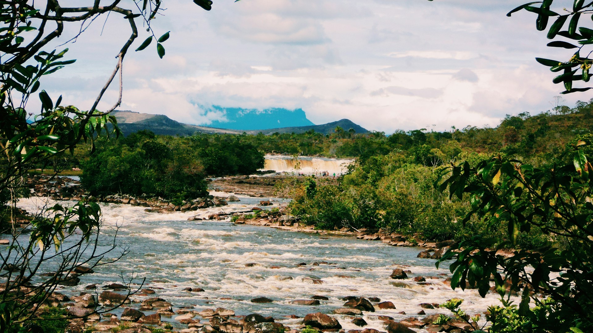 Gran Sabana river, rapids/waterfall and distant tepui