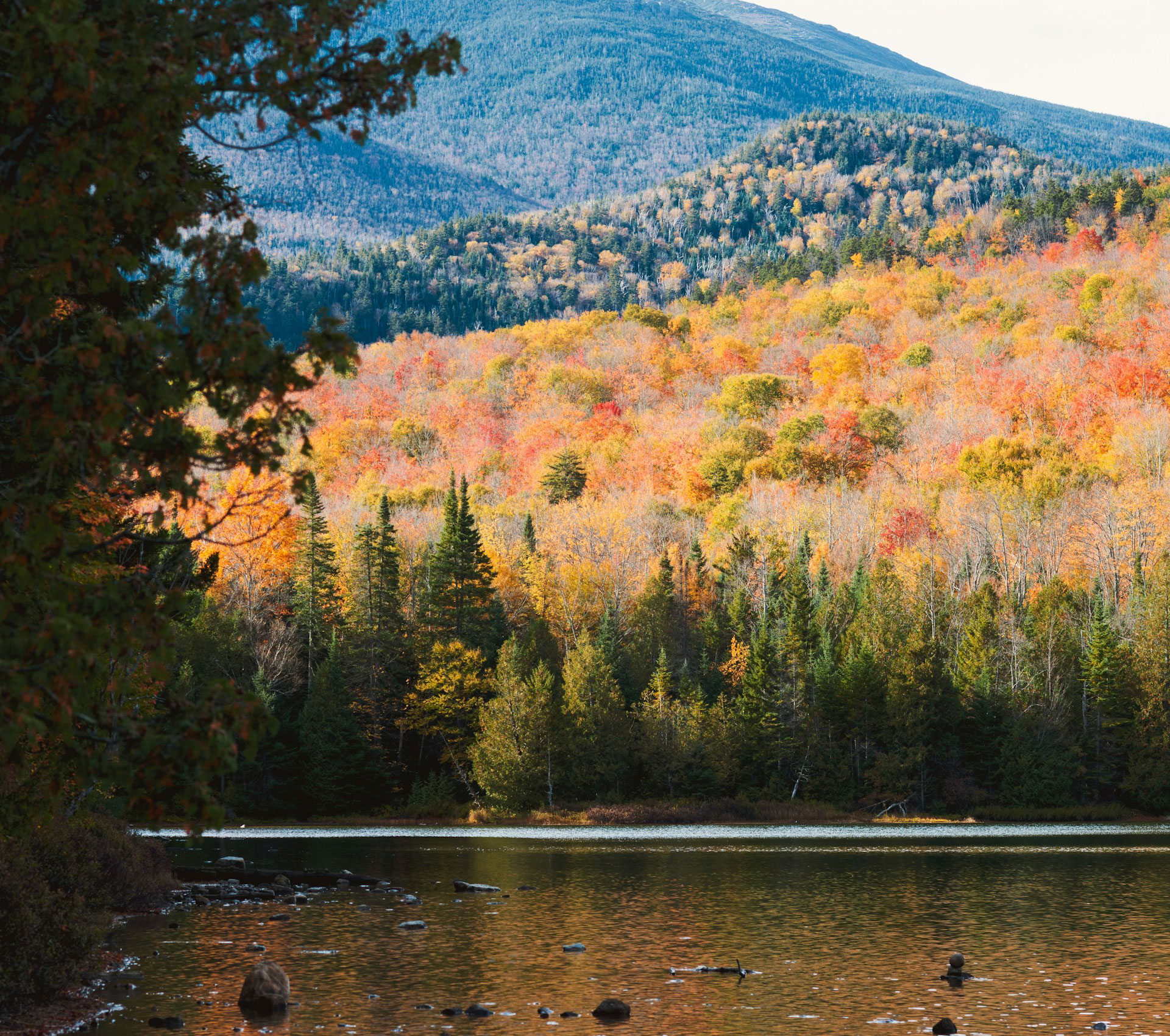 Heart Lake surrounded by Adirondack fall foliage in The Adirondacks, New York