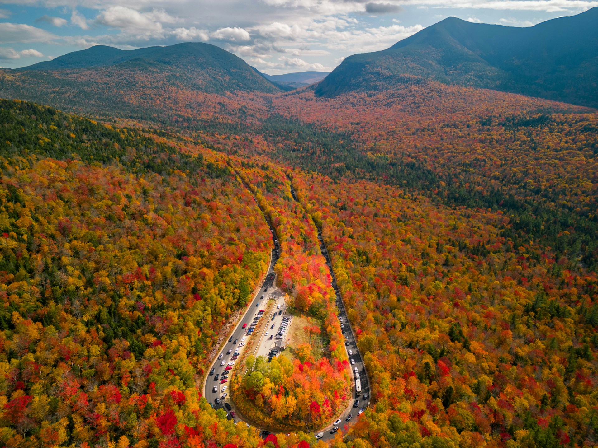 Kancamagus Highway during peak foliage in White Mountains, New Hampshire