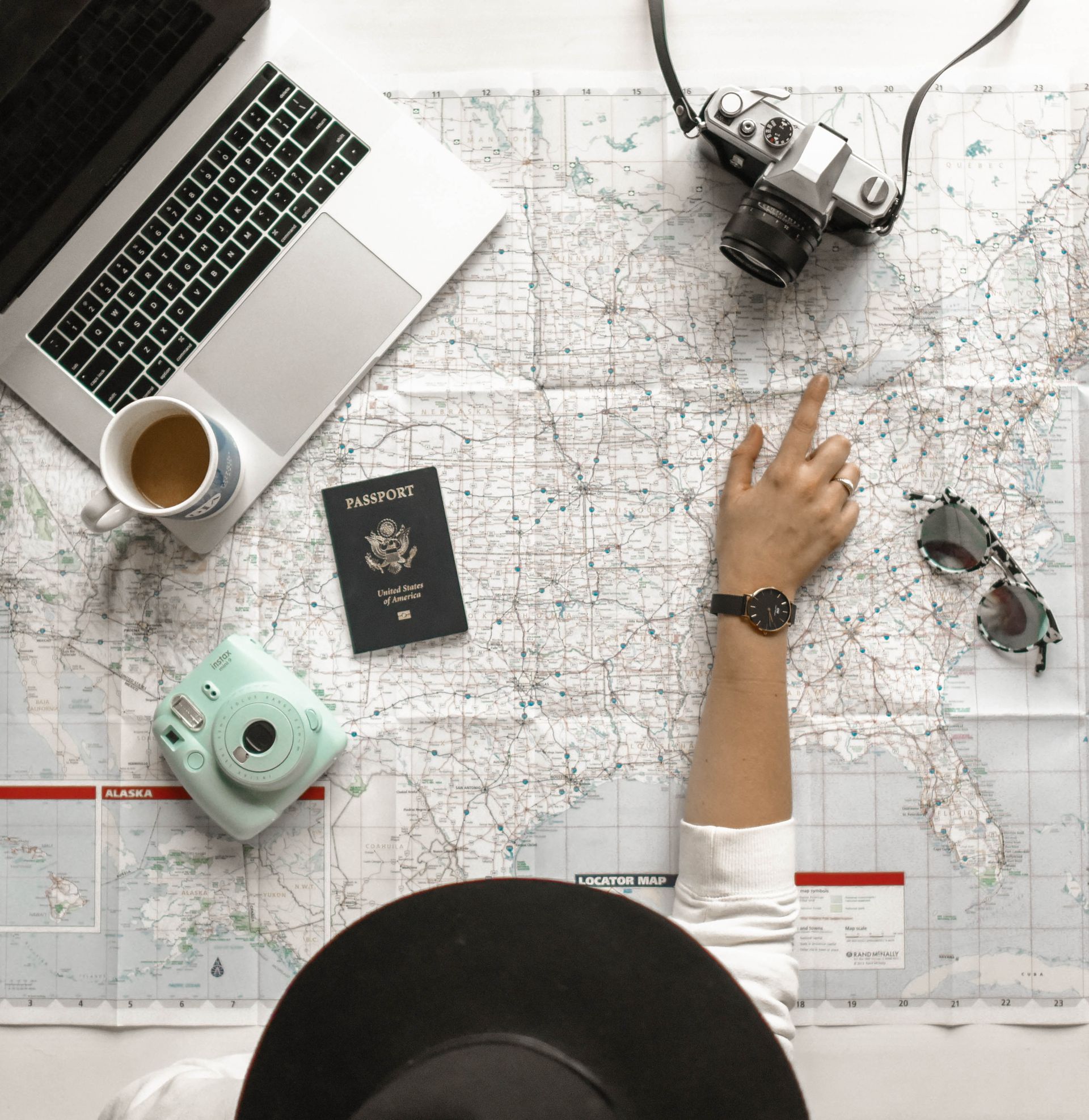 Busy traveller planning a trip quickly on a laptop