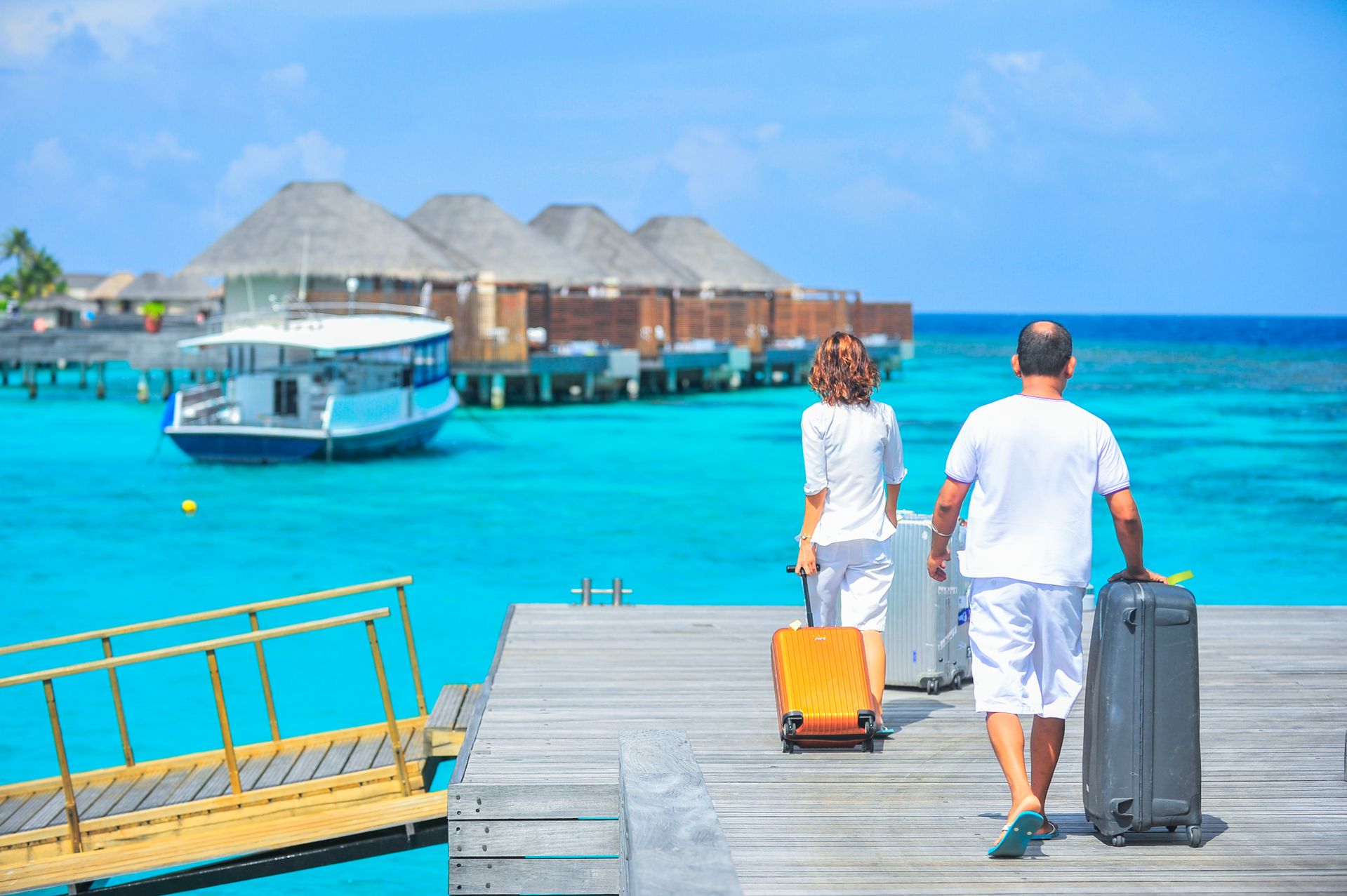 Family arriving at a luxury villa on holiday